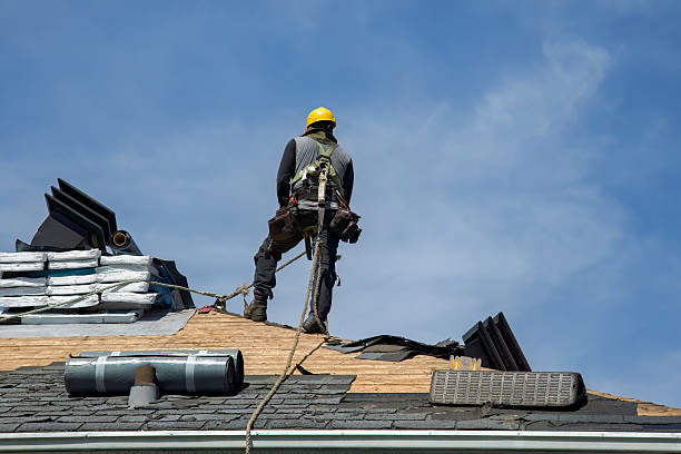 Professional Roofing technician working in Oakfield, TN